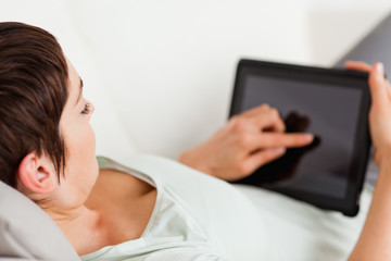 Poster - Woman using a tablet computer