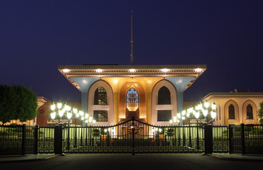 Wall Mural - King`s Palace illuminated at night. Muscat, Oman