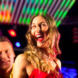 © Kzenon - Clubbing and nightlife - Woman in club or bar having fun