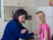 Nurse with Stethoscope checking student patient