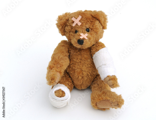 teddy bear with bandage on head