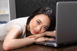 © Darrin Henry - Beautiful asian girl at on laptop computer