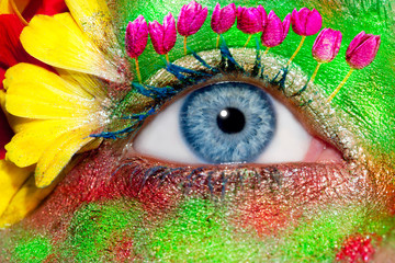 blue woman eye makeup spring flowers metaphor