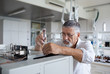 © lightpoet - senior male researcher carrying out scientific research in a lab