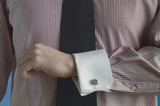 Fototapeta  - Fist, cuff, pink shirt, black tie