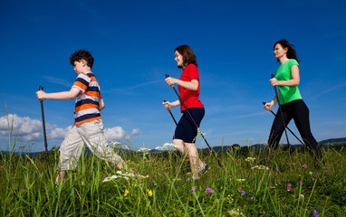 Wall Mural - Nordic walking - active family audoor