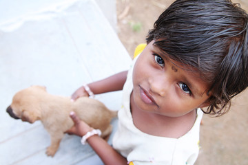 Indian Little Village Girl Holding Little Dog