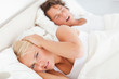 © WavebreakmediaMicro - Angry woman awaken by her boyfriend's snoring