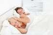 © WavebreakmediaMicro - Annoyed woman awaken by her boyfriend's snoring