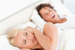 © WavebreakmediaMicro - Annoyed woman awaken by her fiance's snoring