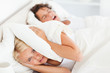 © WavebreakmediaMicro - Woman awaken by her husband's snoring