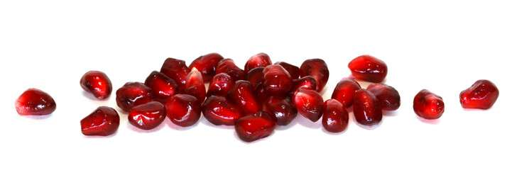 Wall Mural - pomegranate seeds over white background