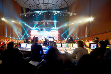 operators at control panels at concert