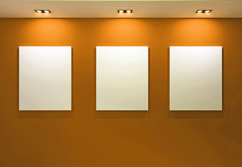 Gallery Interior with empty frames on orange wall