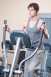 © mr.markin - Young man at the gym exercising. Running