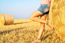 Woman Enjoying On The Wheat Field
