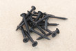 A heap of black screws