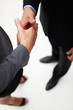 © Monkey Business - Detail businessman and woman shaking hands
