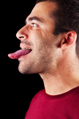 male man with tongue out