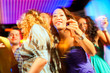 © Kzenon - Party people dancing in disco or club