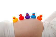 Pregnant Belly With Colorful Rubber Ducks