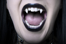 Opened Vampire Woman Mouth Closeup