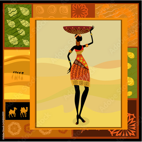 Obraz w ramie African girl dressed in a decorative