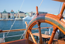 Ship Helm And A View On Stockholm, Sweden