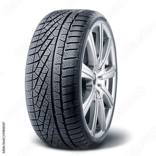 Fotografía Winter tire with alurim on white background