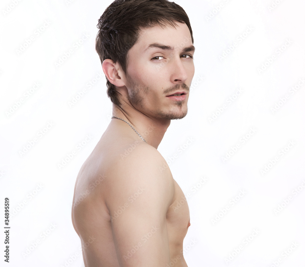 Beautiful brunette guy with an athletic body isolated on white. Stock Photo  | Adobe Stock, image size:1000x874