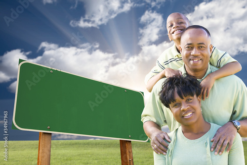 Fotografia, Obraz African American Family in Front of Blank Green Road Sign