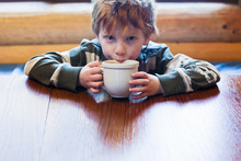 Caucasian Boy Drinking Hot Chocolate