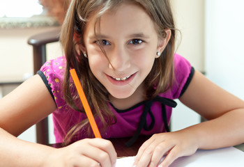 Small girl working on her homework