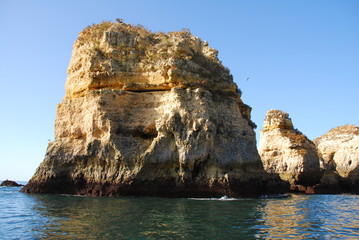 Wall Mural - Yellow cliffs in Lagos in the Algarve Portugal