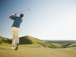 © Erik Isakson/Blend Images - Black golfer swinging golf club