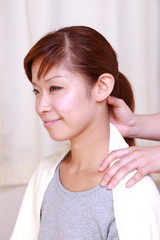 Wall Mural - young japanese woman getting a massage