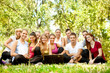 © luckybusiness - young students with laptop outdoor