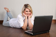 © Darrin Henry - Beautiful young woman using internet at home