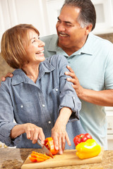 Wall Mural - Senior couple cooking