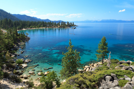 Wall mural - Lake Tahoe overview with kayakers on water - lake tahoe