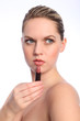 © Darrin Henry - Beautiful naked woman using red lip stick make up