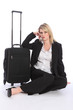 © Darrin Henry - Beautiful business woman traveller with suitcase
