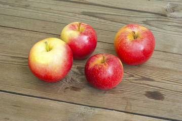 apples on wooden table