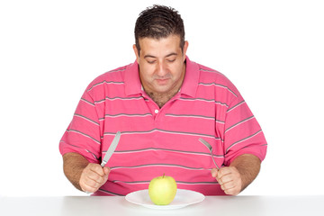 Fat man eating a apple