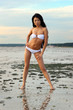 © Igor Kovalchuk - Asian woman in white bikini