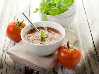 Poster - tomato soup with basil leaf on bowl