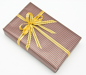 Black gift box with white bar attached gold ribbon