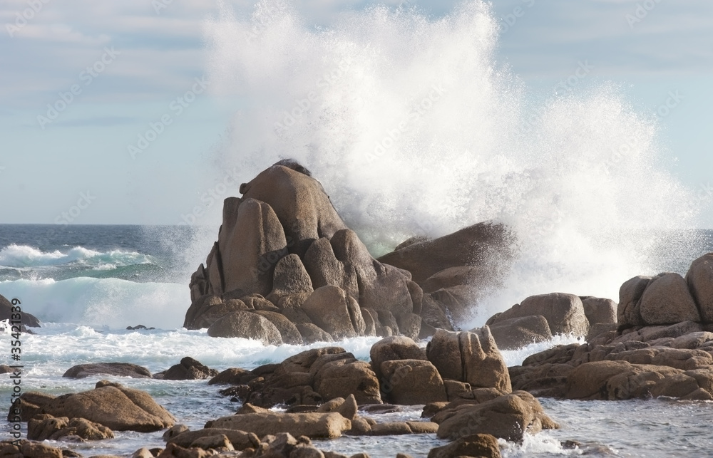 sea rock is breaking powerful wave - obrazy, fototapety, plakaty 
