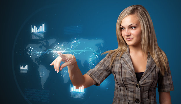 Businesswoman pressing high tech type of modern buttons