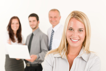 Wall Mural - Business woman pretty with colleagues posing